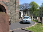 Modern Jaguar S-Type in silvery blue metallic at a wedding in May 2010