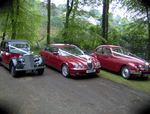 1946 Rover Fourteen P2, modern Jaguar S-Type in metallic red and 1954 Bristol 403 at a wedding in May 2011