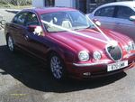 Jaguar S-Types in Metallic Red and Metallic Silver at a wedding on 28 April 2012